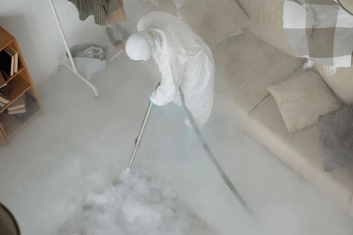 Biohazard cleanup technician in protective equipment, Babylon, NY